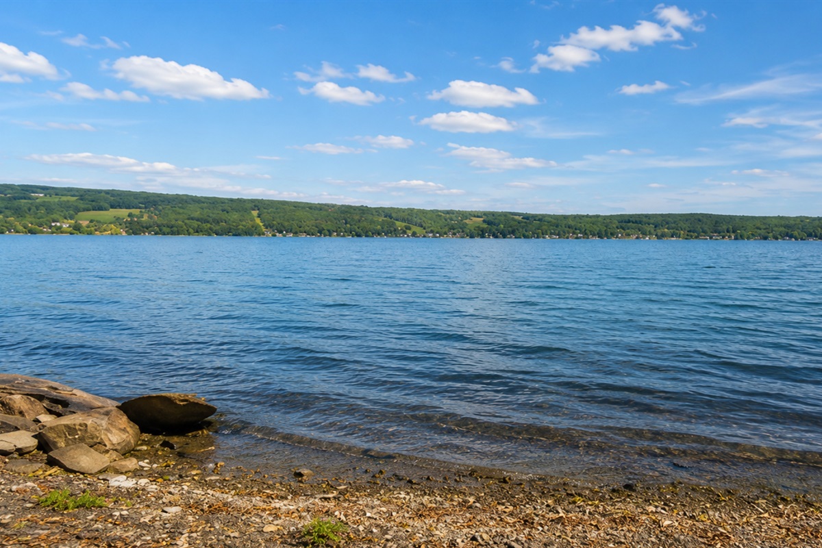Expansive water views showcase the beauty of the Finger Lakes, a perfect backdrop for unforgettable moments.