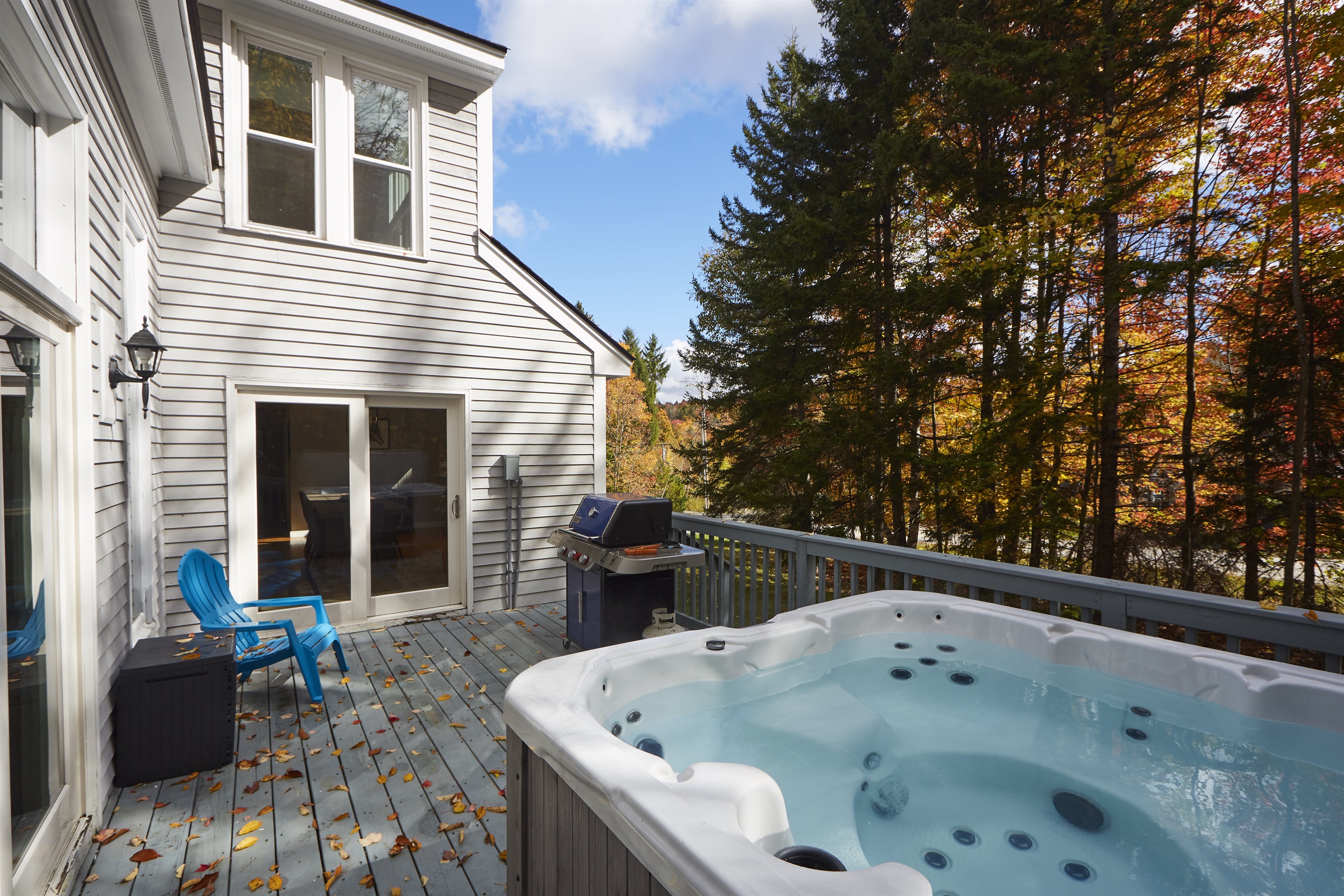 Unwind in the hot tub on the private deck, surrounded by Vermont's vibrant fall colors or falling snow. Whether you're grilling or soaking in the views from the new hot tub, this peaceful retreat offers the perfect outdoor escape.