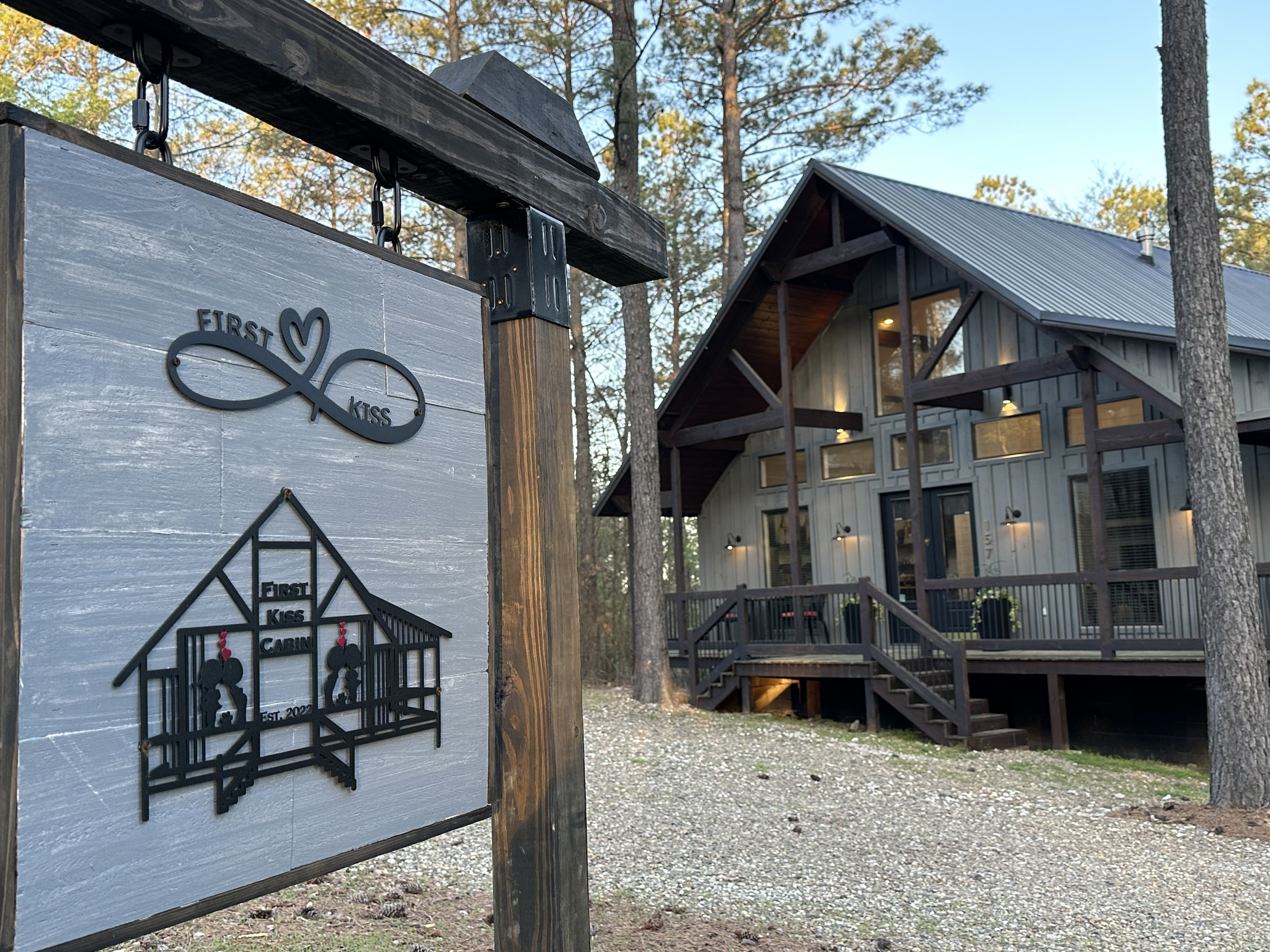 Our First Kiss cabin sign!