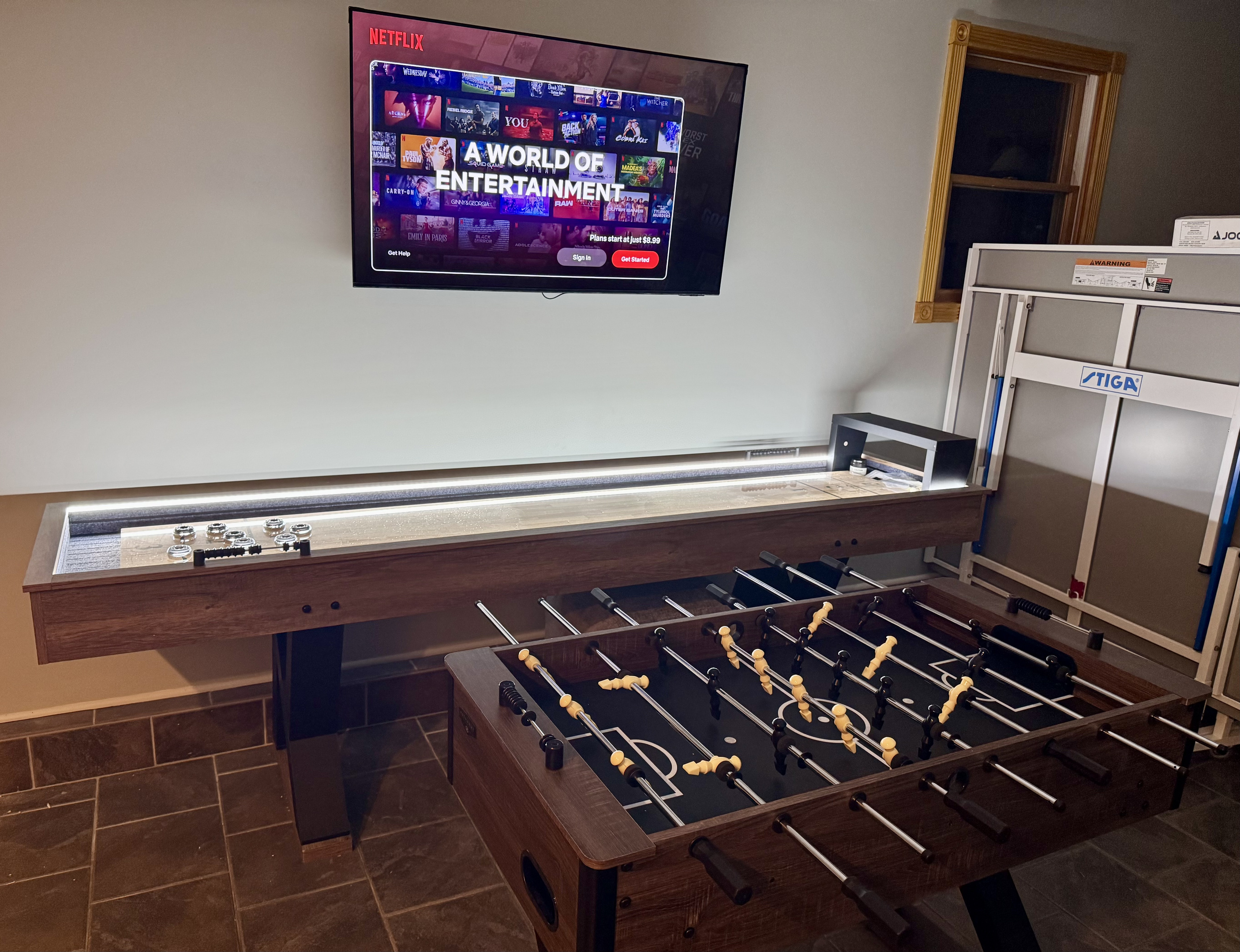 Shuffleboard, foosball, karaoke and game lounge
