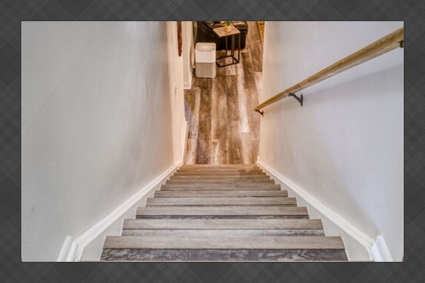 Single flight of stairs leading into the suite.