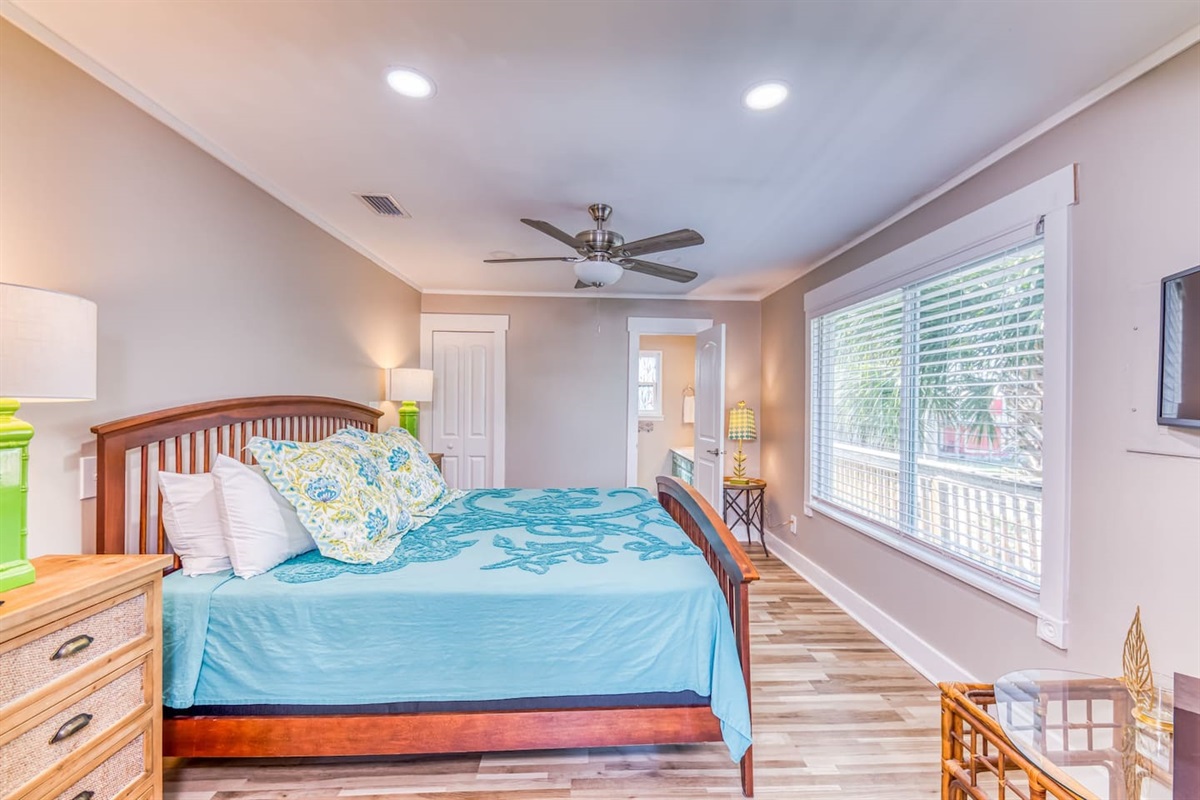 Bedroom Retreat: Bright spaces and cheerful decor invite relaxation after beach adventures!