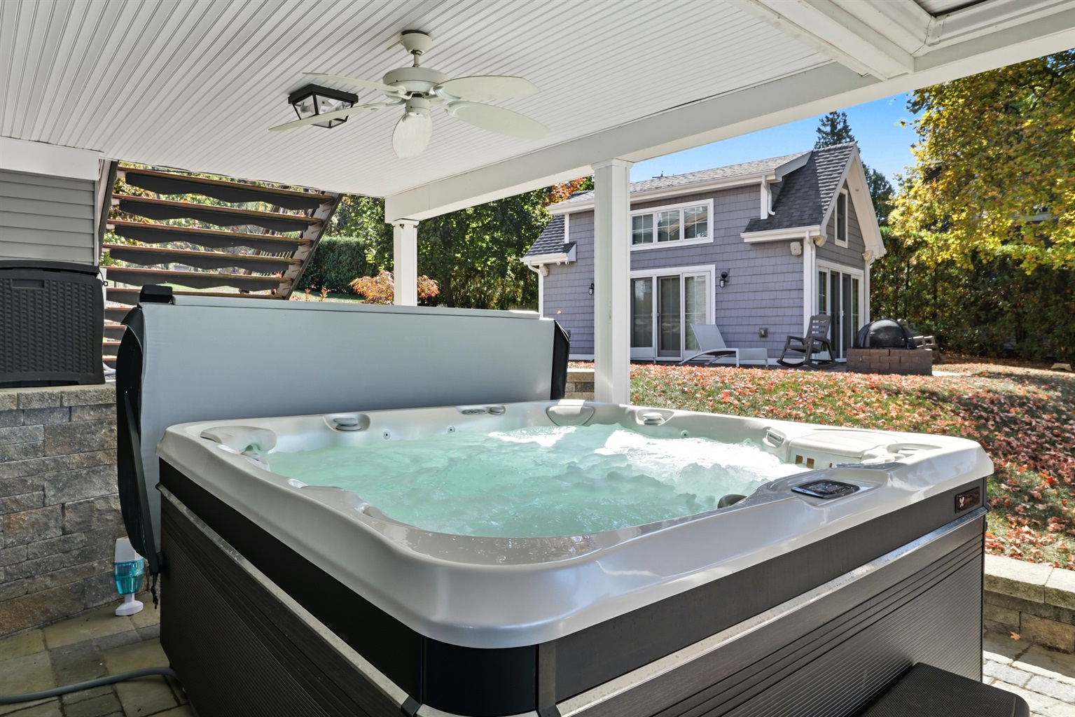 Unwind in the bubbling hot tub with views of the lake.
