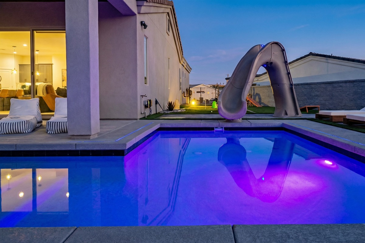 Plunge into the pool on the 8-foot water slide!