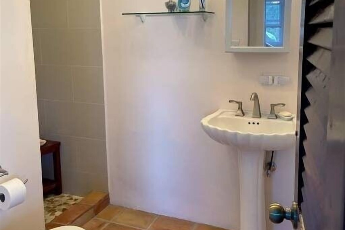 The bathroom is on the main, entry level of the studio.