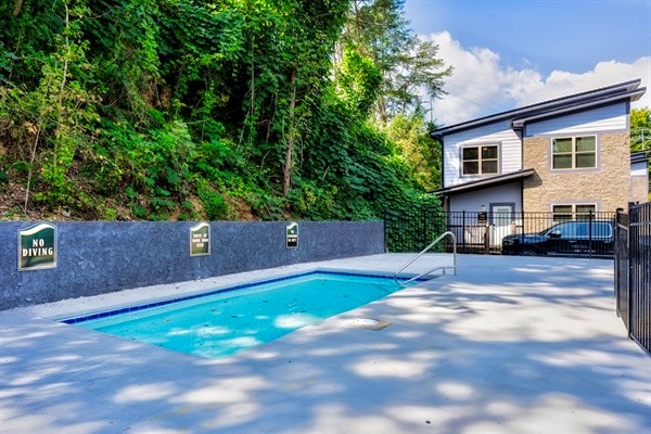 Fun and relaxation await with a shimmering pool, a playground for the little ones, and a spacious dog park to keep everyone happy.