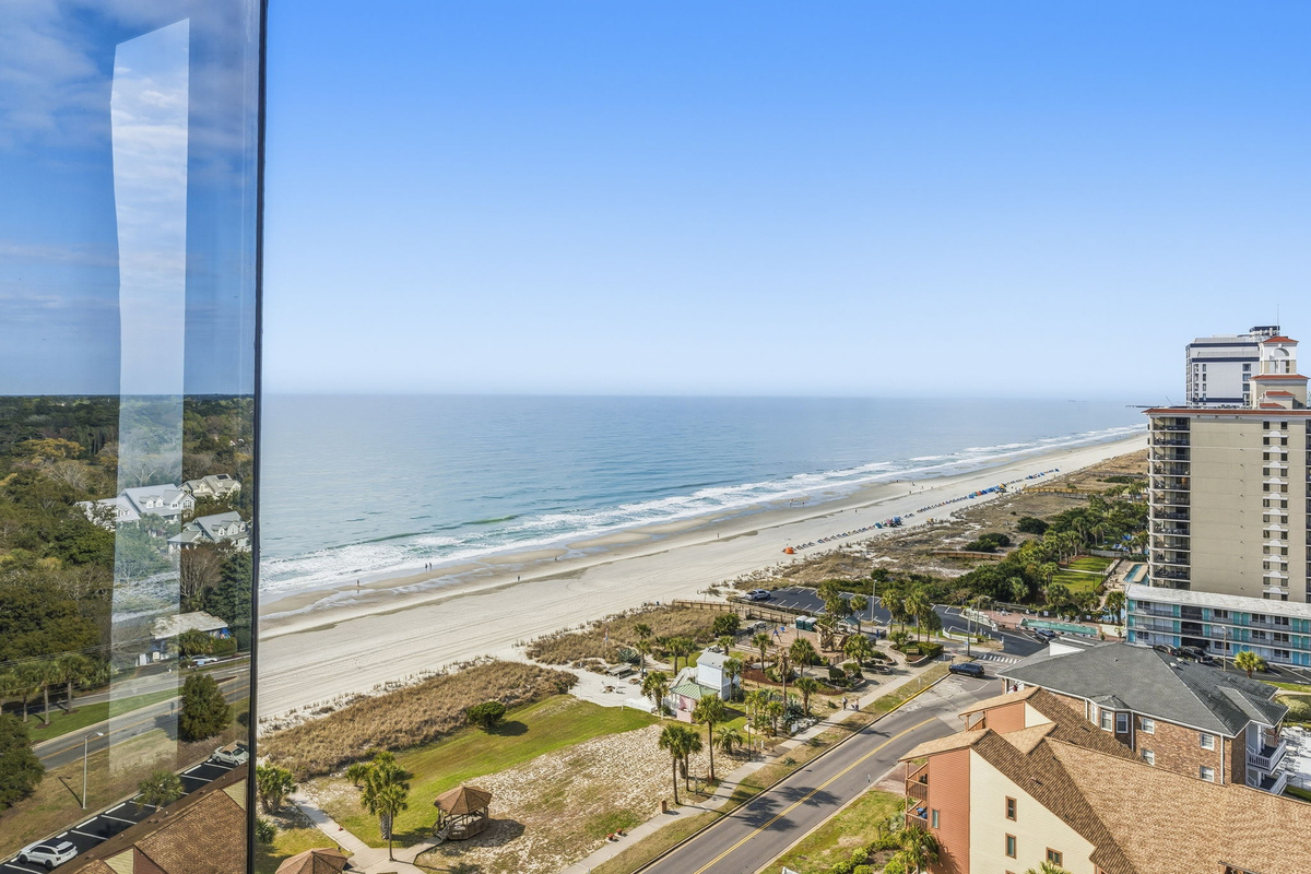 View of the beach and coastline from the penthouse balcony