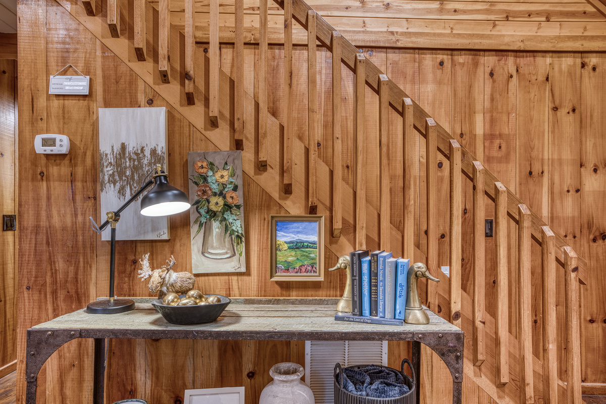 Staircase with a console table.