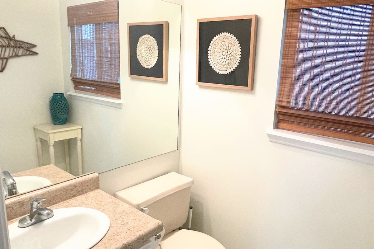 Use the main-level half bath so no one treks upstairs mid-movie or mid-dinner.