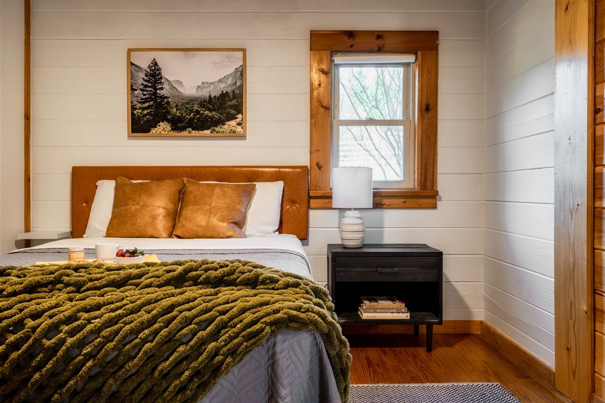 Experience the ultimate in comfort and coziness in our inviting bedroom.