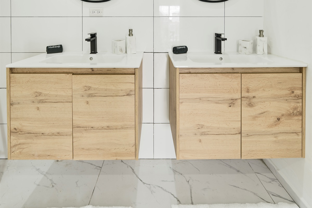 Contemporary Double‑Sink Vanity with Warm Wood Cabinetry