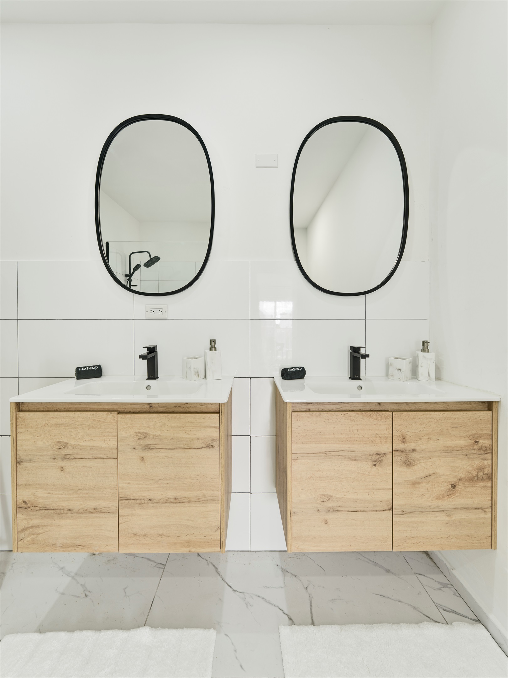 Contemporary Double‑Sink Vanity with Warm Wood Cabinetry