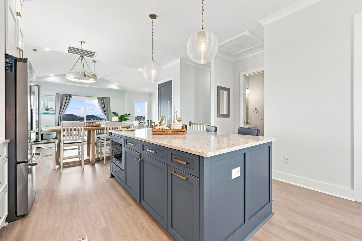 The heart of the home, this oversized island offers the perfect place for casual dining, morning coffee, and gathering with loved ones