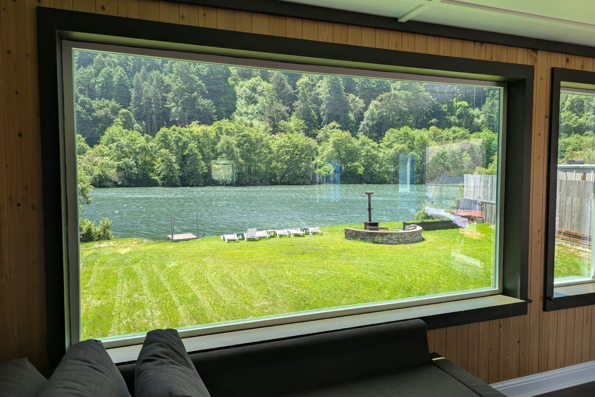 Enjoy the luxury of a king-size bed and sweeping waterfront views, creating an unforgettable setting for your stay along the Russian River.