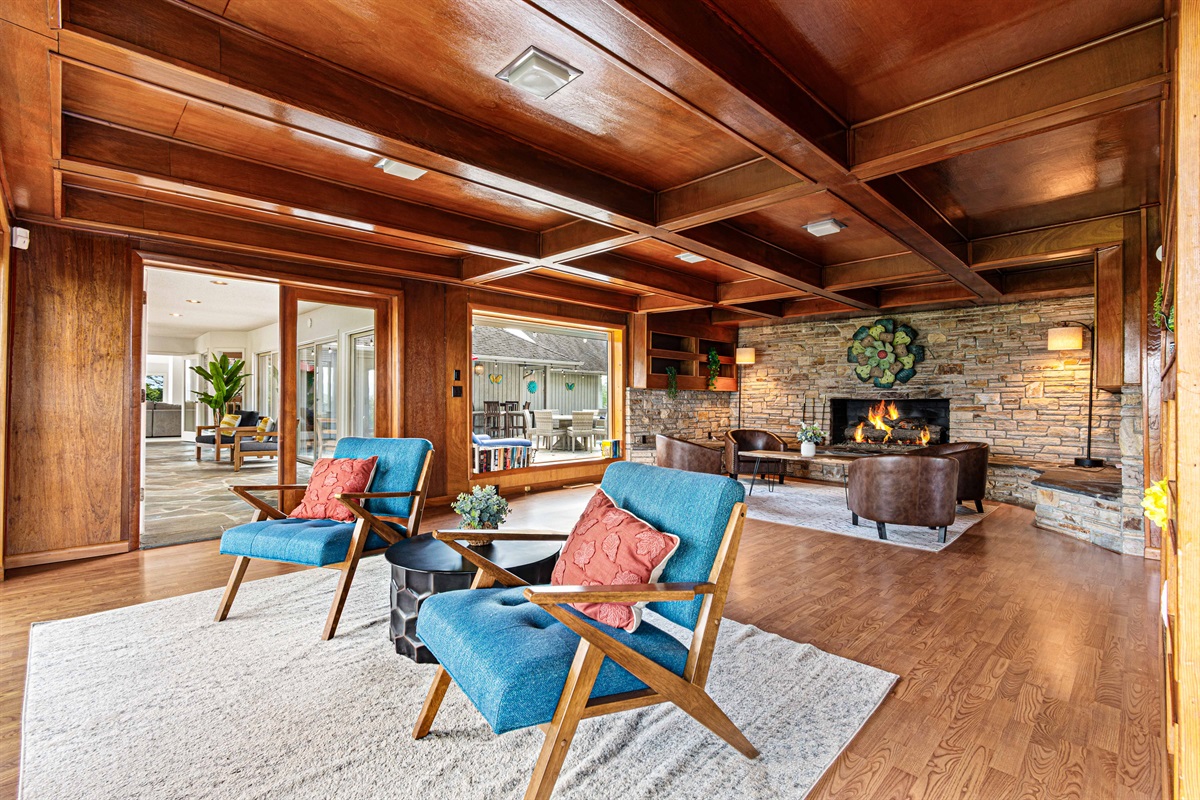 Living Room: Expansive space with stylish decor, perfect for relaxation by the fireplace!