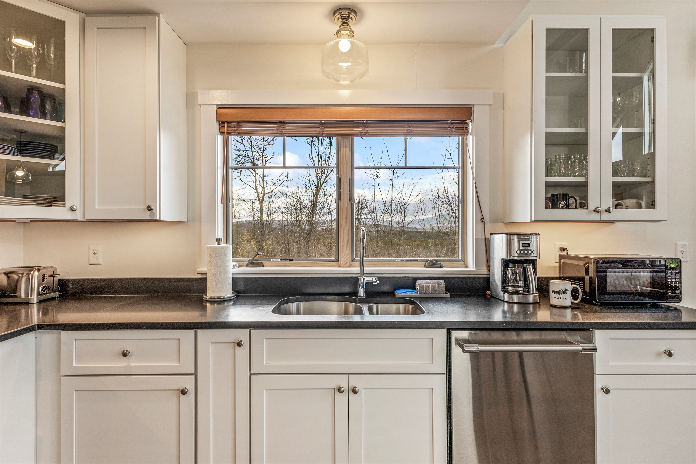 Fully equipped kitchen with a stylish island, perfect for cooking and gathering.