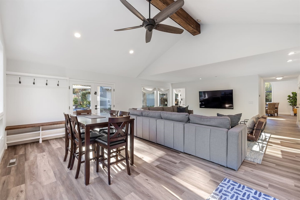 Counter-height game table let's guests play a game or have a snack with a great elevated view of the TV.