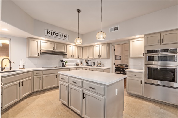 Bright open kitchen with modern finishes, perfect for culinary adventures!