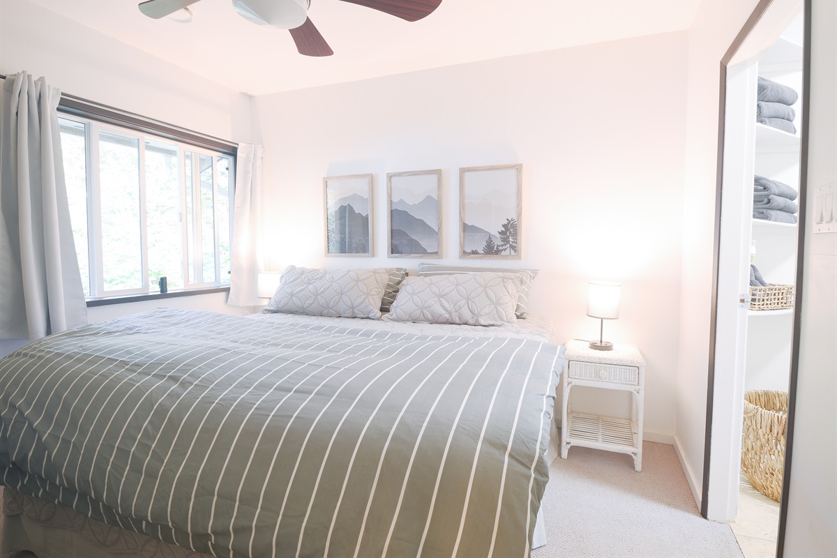 King bedroom with ensuite and soft natural light 