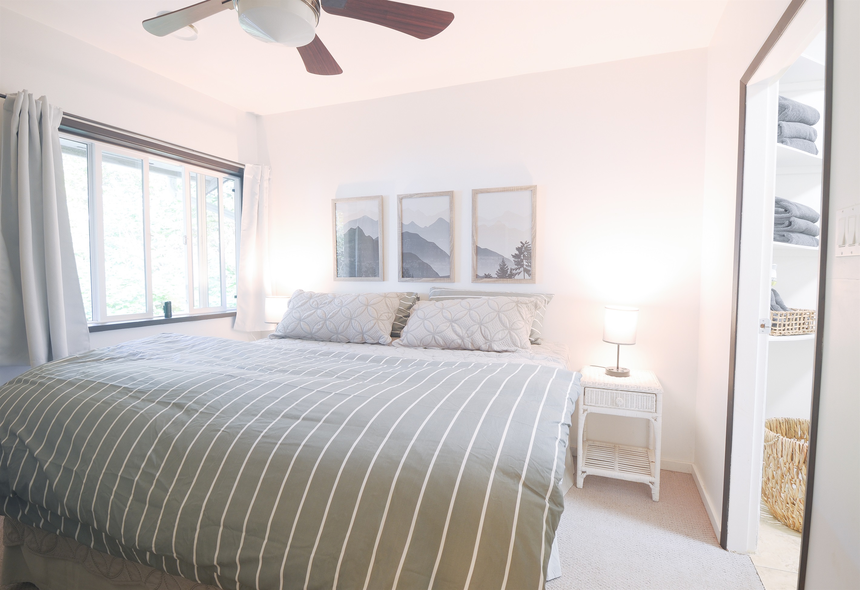 King bedroom with ensuite and soft natural light 