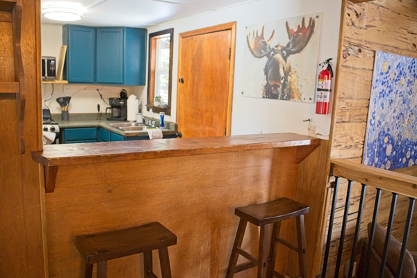 Pull up a seat at your cozy breakfast bar, where warm wood tones and an open kitchen make it easy for you to gather, sip, and start your day.