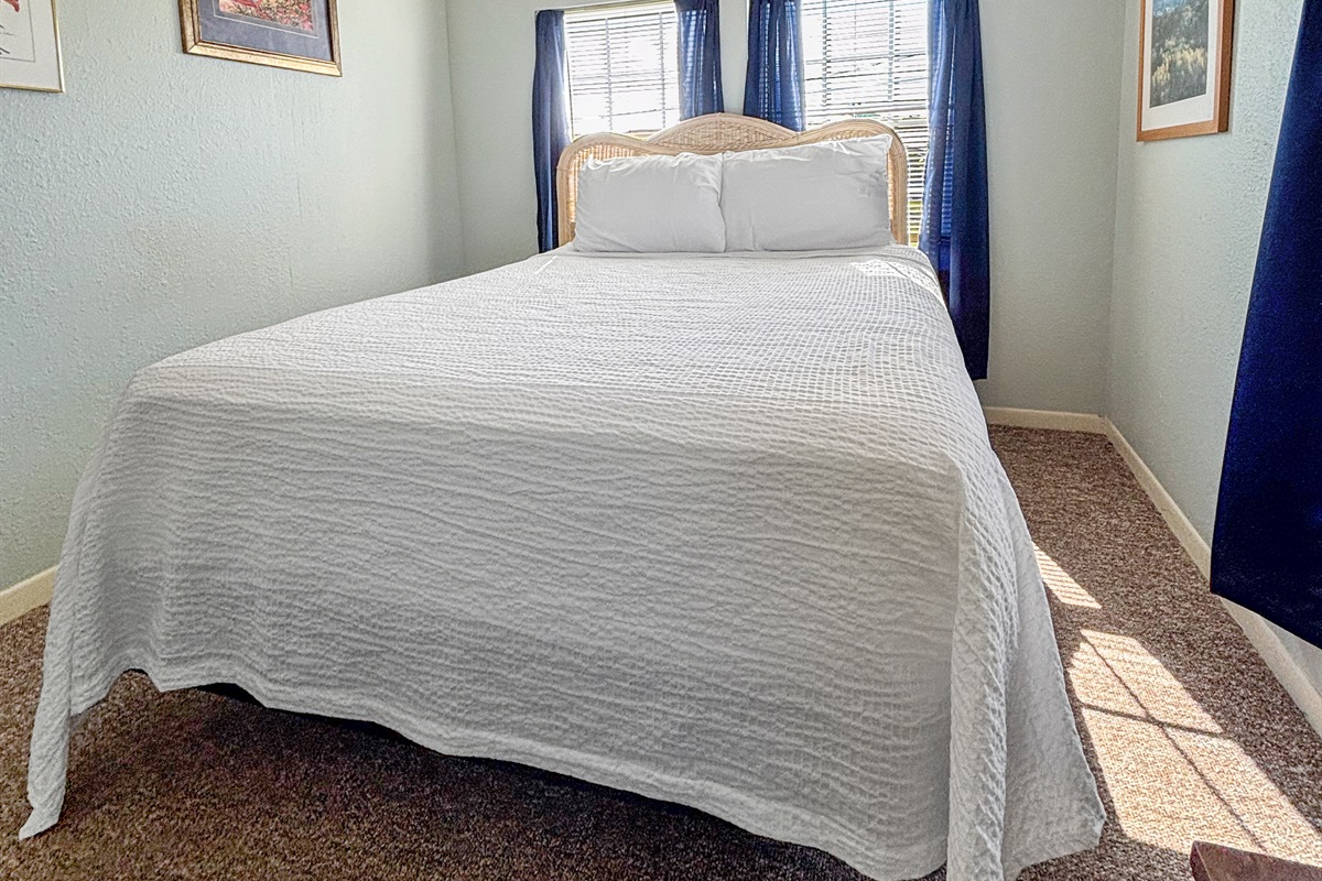 Light and airy guest bedroom upstairs