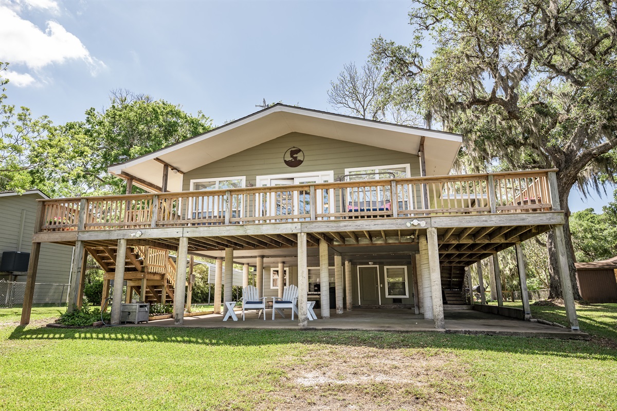 View from the creek side of the house. Amazing patio, overlooking the water!