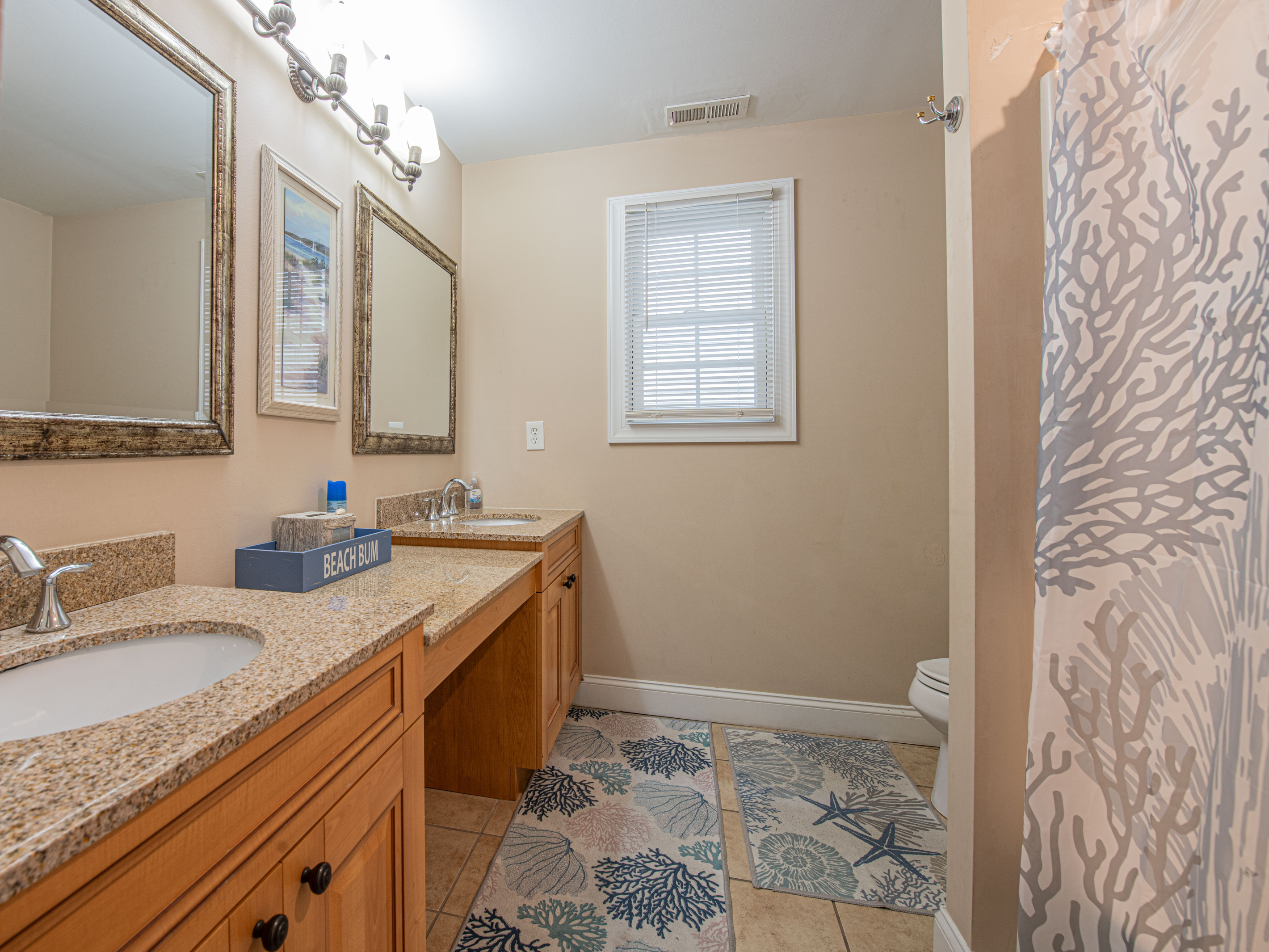 Bathroom 2 with Coral Shower Curtain and Beach Bum Decor