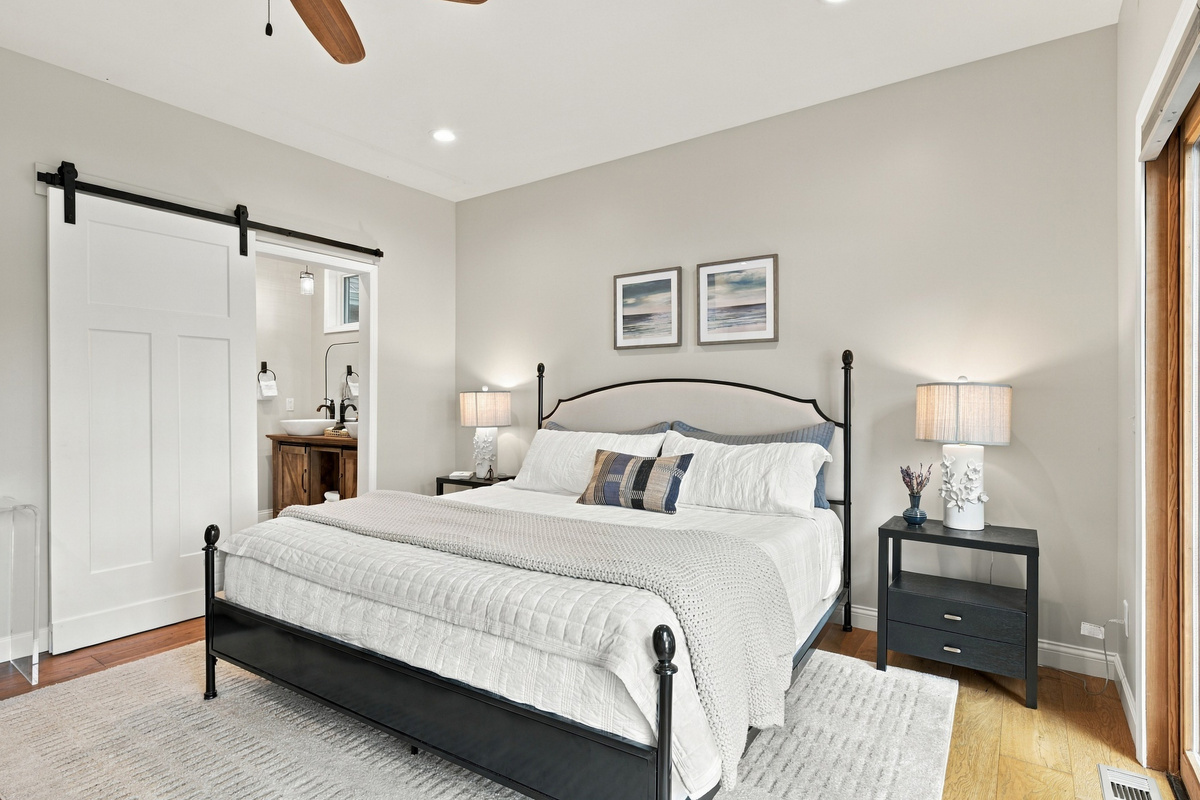 Enjoy your private ensuite bath in the primary king bedroom. Doors have been widened for accessible access. 