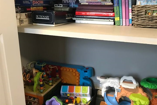 Stocked with games, kids books, baby books, comic books, puzzles, card games and toys