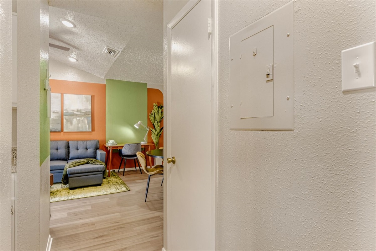 A pop of color welcomes you home — a cozy, modern space where creativity and comfort meet.