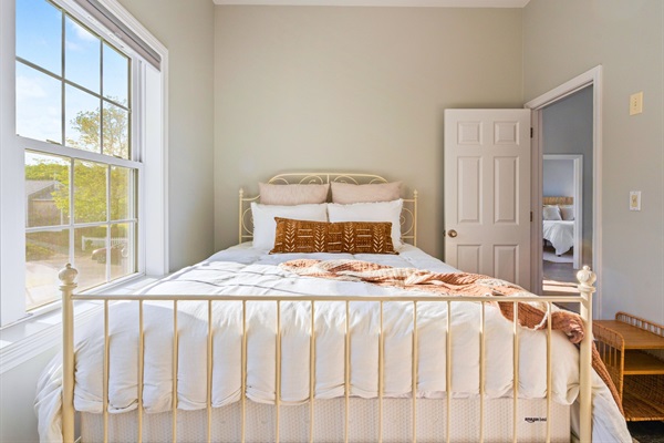 Conveniently located on the main floor, the third bedroom offers a welcoming and restful haven.