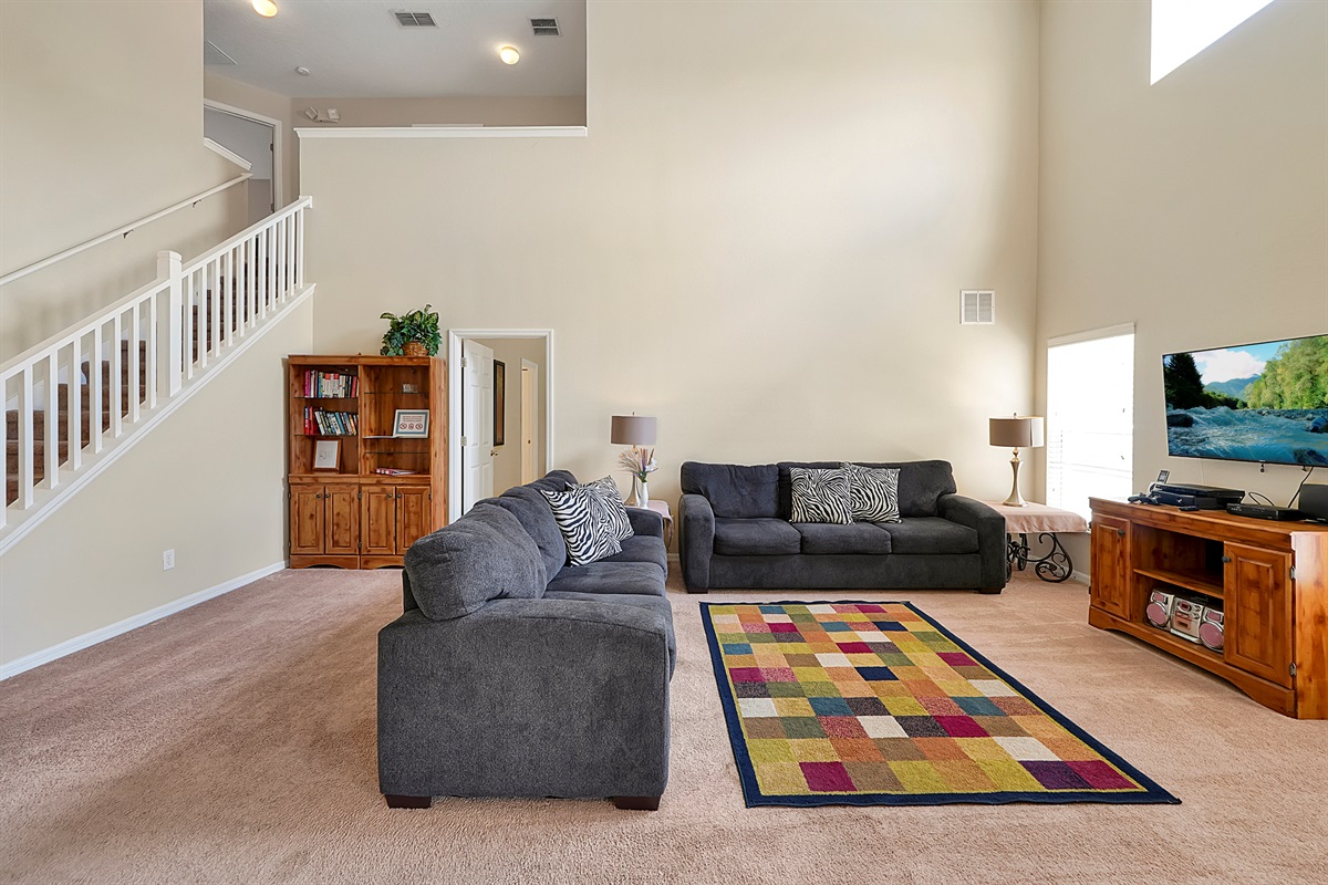 Entertainment central: enjoy movie marathons on the large screen TV in this inviting living space. 