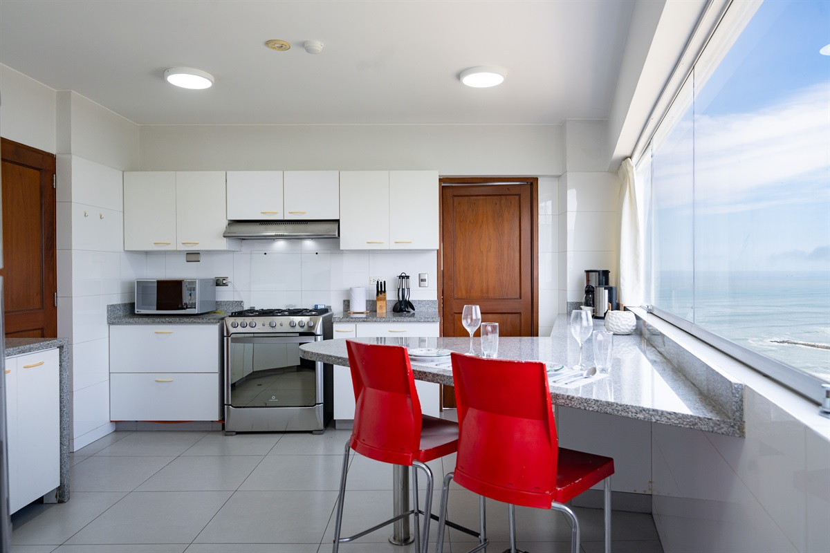 Gourmet Kitchen with a View: Fully equipped and designed so the ocean remains your constant backdrop while preparing your favorite meals