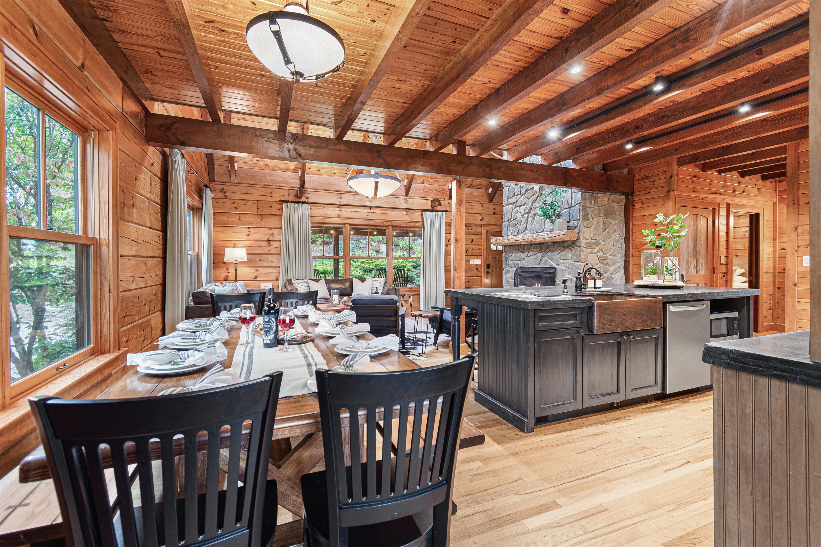 Kitchen, dining, and family areas are open so mom is left alone in the kitchen.
