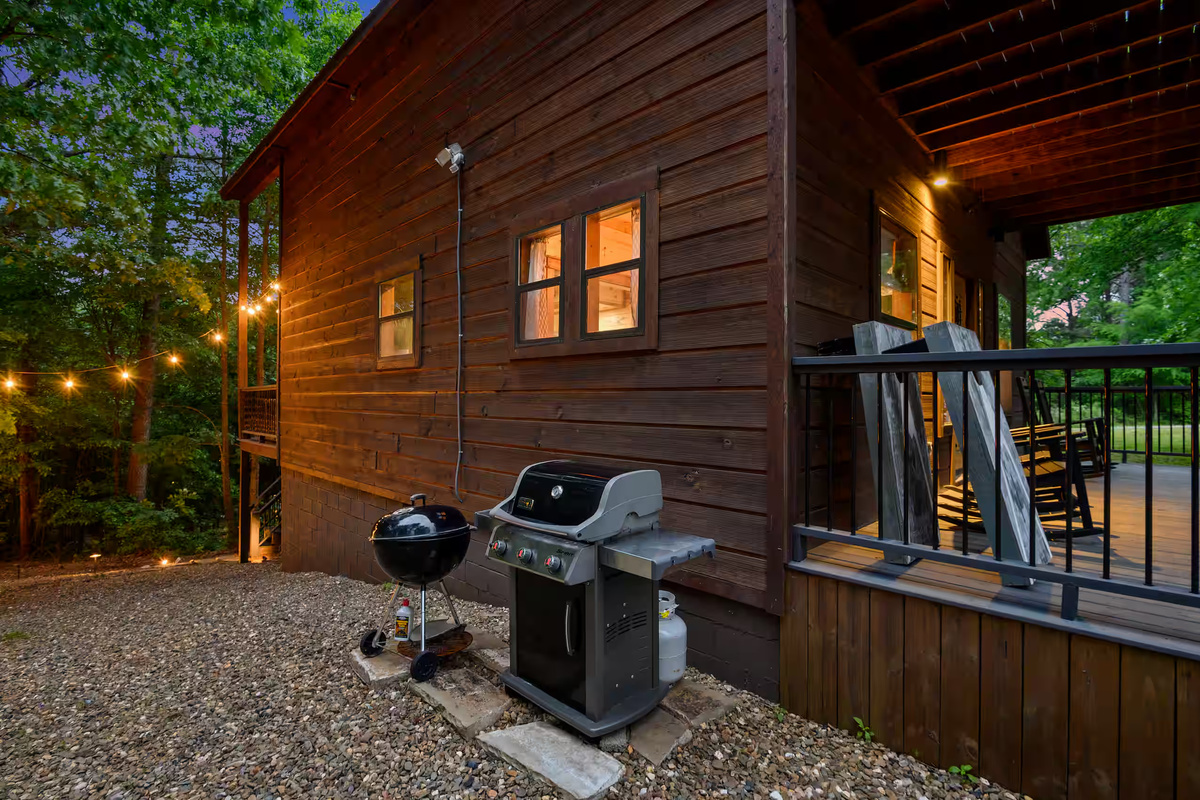 Outdoor Living Space: Sizzle up some fun with our BBQ grill and relaxing views under twinkling lights!