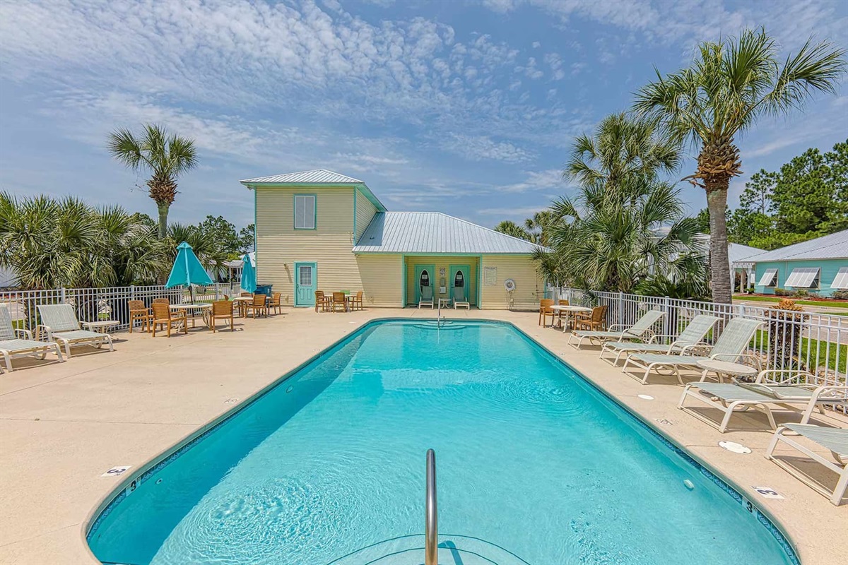 Poolside Paradise: Splash and relax by the sparkling pool surrounded by swaying palms!