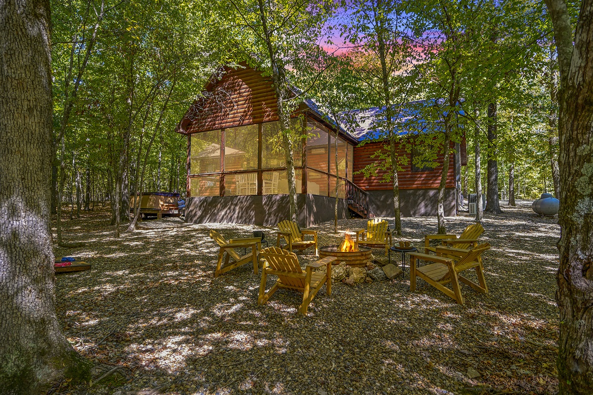 The glass sunroom is showcases the oversized lot and all the tall timbers.