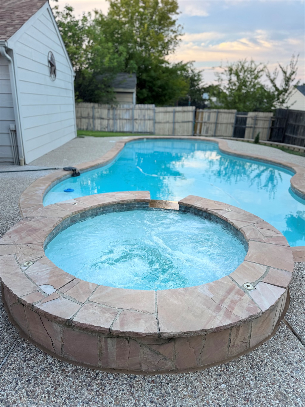 The pool & Spa area boasts spacious backyard, outdoor furnitures, grill and seating area.