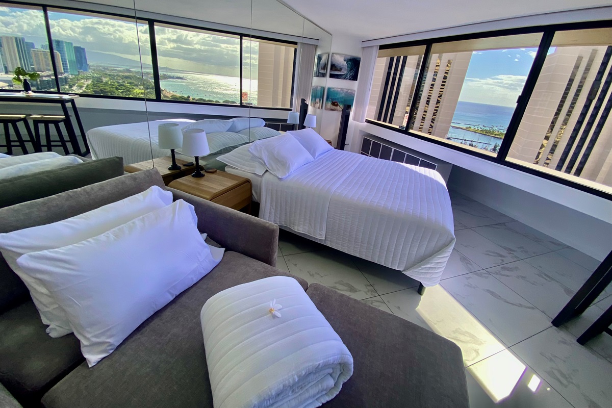 Wake up to sweeping ocean views and the golden light of Waikīkī mornings. This stylish studio offers a serene space with modern comfort, where every sunrise feels like a postcard from paradise.
