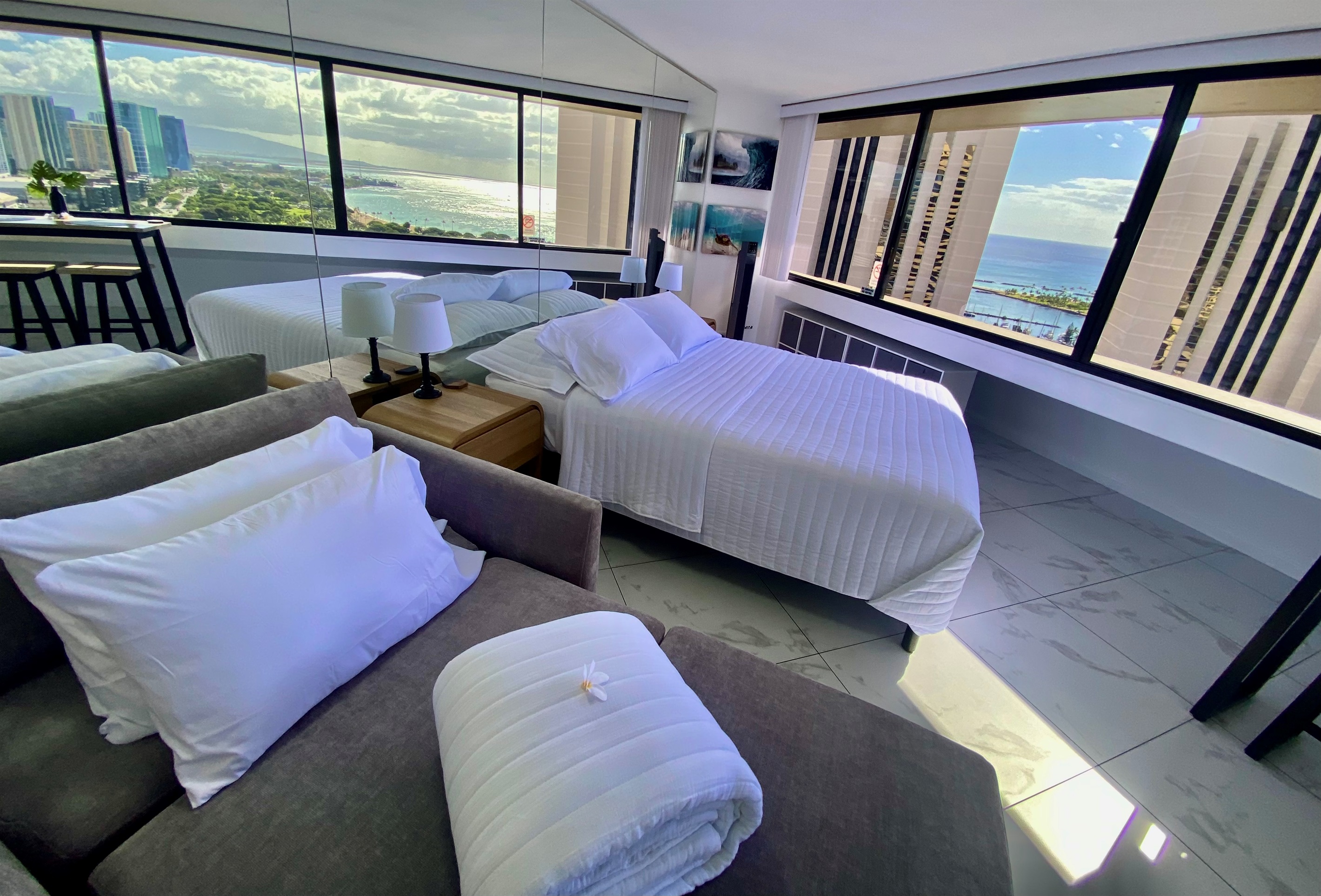 Wake up to sweeping ocean views and the golden light of Waikīkī mornings. This stylish studio offers a serene space with modern comfort, where every sunrise feels like a postcard from paradise.