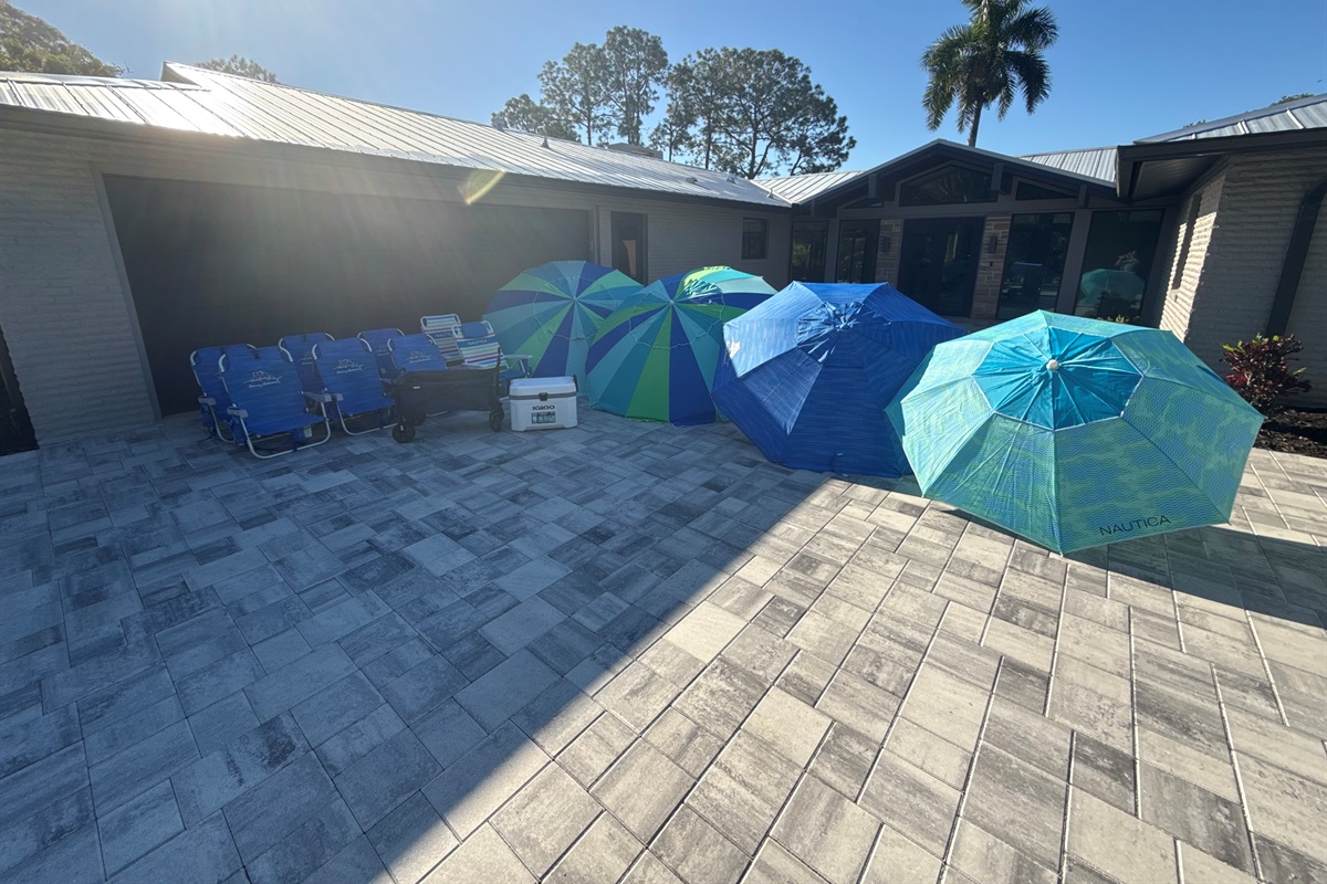 Lots of high quality Tommy Bahama beach chairs, umbrellas, cooler and beach buggy for your day at the beach