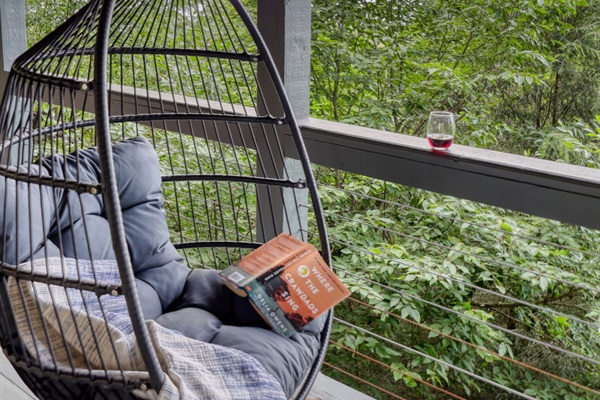 If you're craving some quiet time, sneak off to the lower deck and nestle in the swinging chair with a blanket and good book.