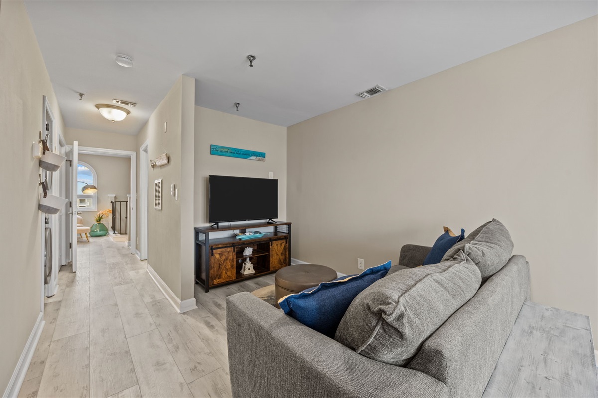 Bonus TV lounge in 2nd master bedroom, ideal for spreading out, watching movies, or enjoying a quiet reading corner