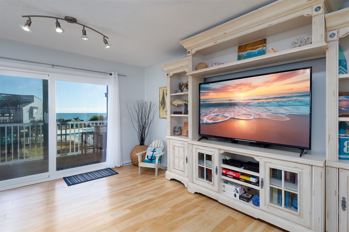 Living area with large TV for all your movie nights