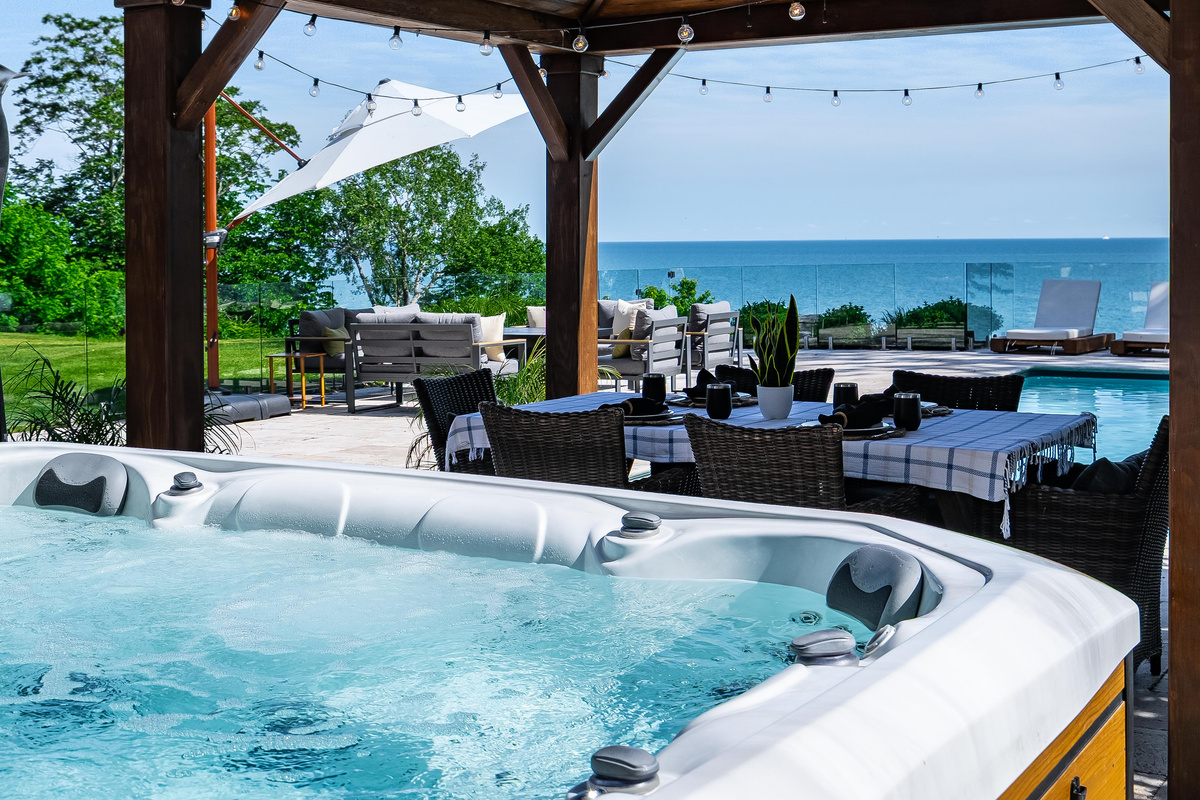 Relax and recharge in the private hot tub. 