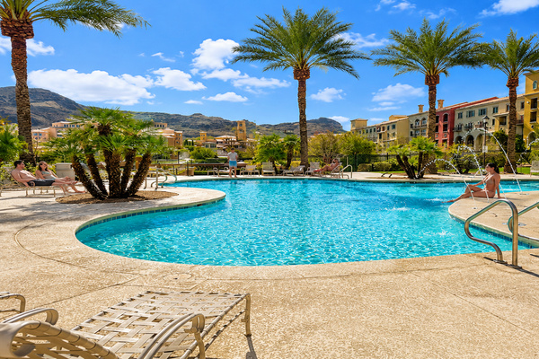 Relax at the resort-style pool and hot tub with mountain views.