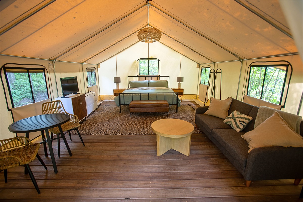 Main bed is a King. Couch folds into twin size bed.