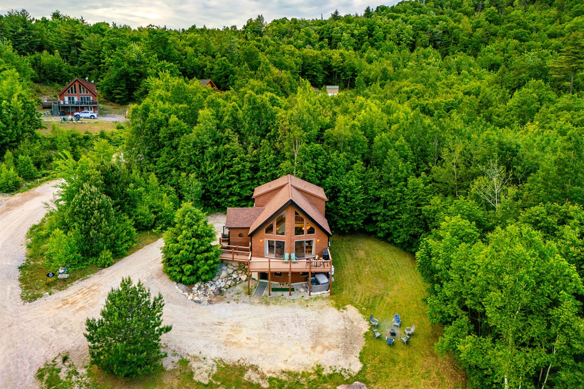 Capture the scale and charm of the home with an elevated view