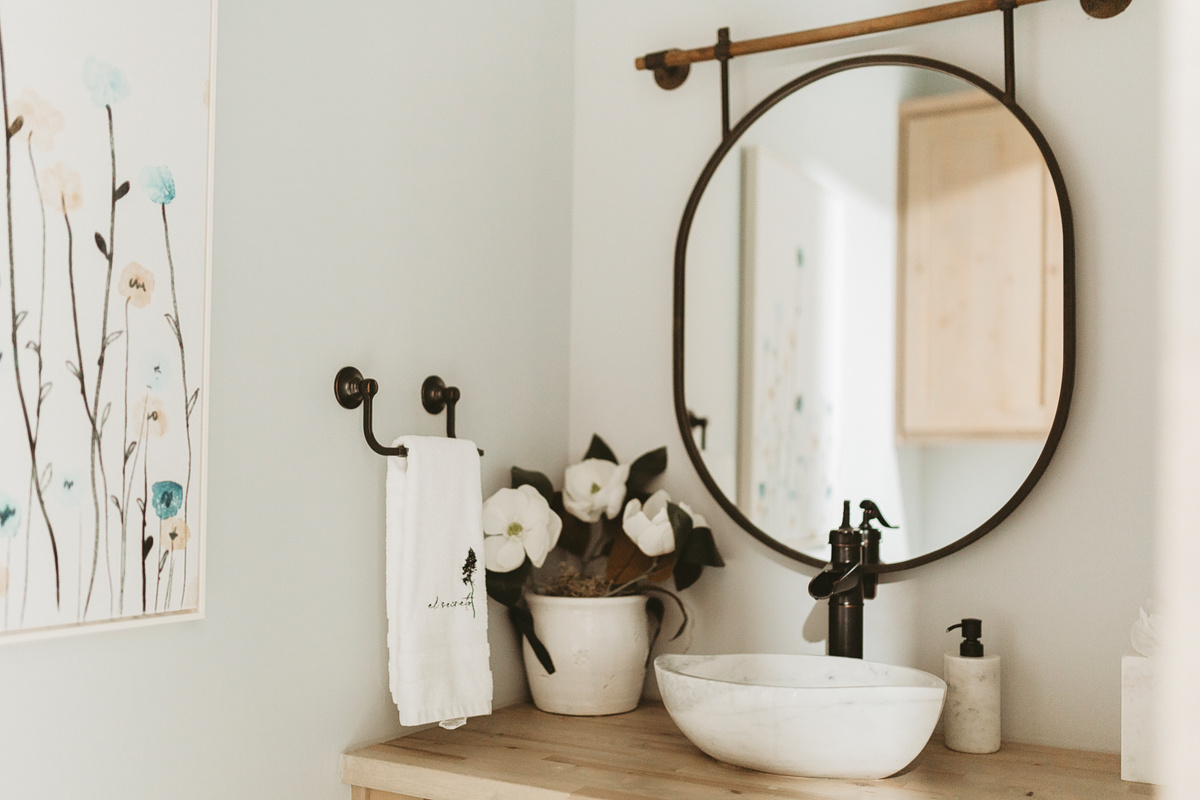 Half bathroom with a vessel sink.